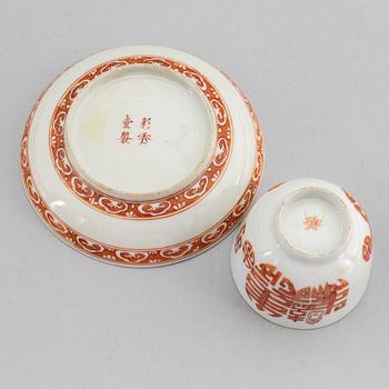 A Chinese porcelain red iron decorated cup and saucer, late Qing dynasty, 19th Century.