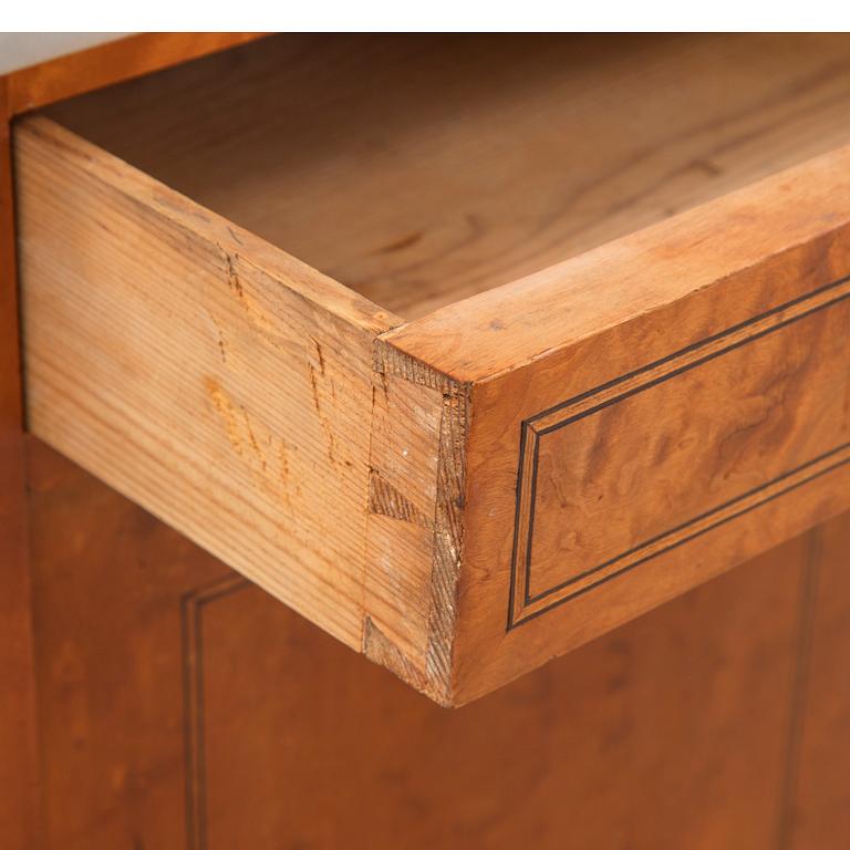 A pair of early 20th century bedside tables.