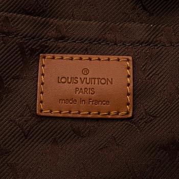 Louis Vuitton, an "Onatah GM" suede bag.