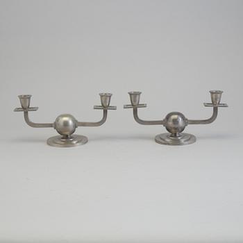 GAB, a pair of pewter candelabra, 1936-7.