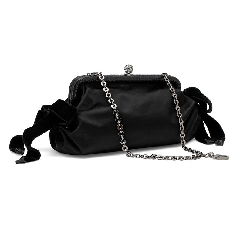 SALVATORE FERRAGAMO, a black silk evening bag.