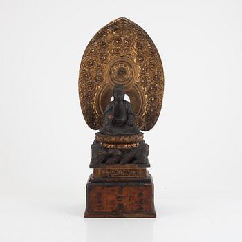 A Japanese lacquer and gilt-decorated wood Buddha Amida figure, Edo (1603-1867).