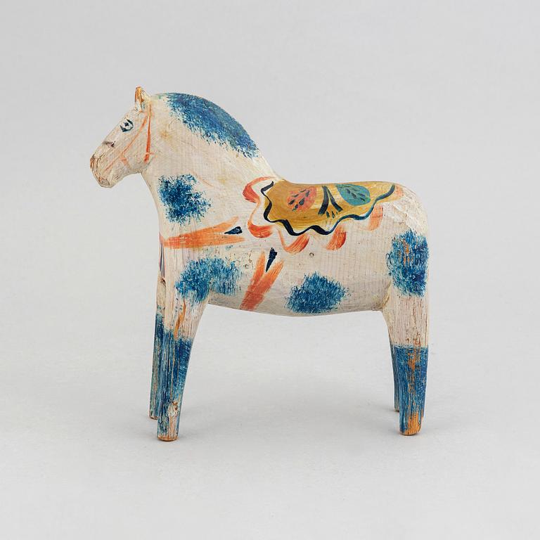 A wooden carved and painted 'Dalahäst', early or mid 20th century.