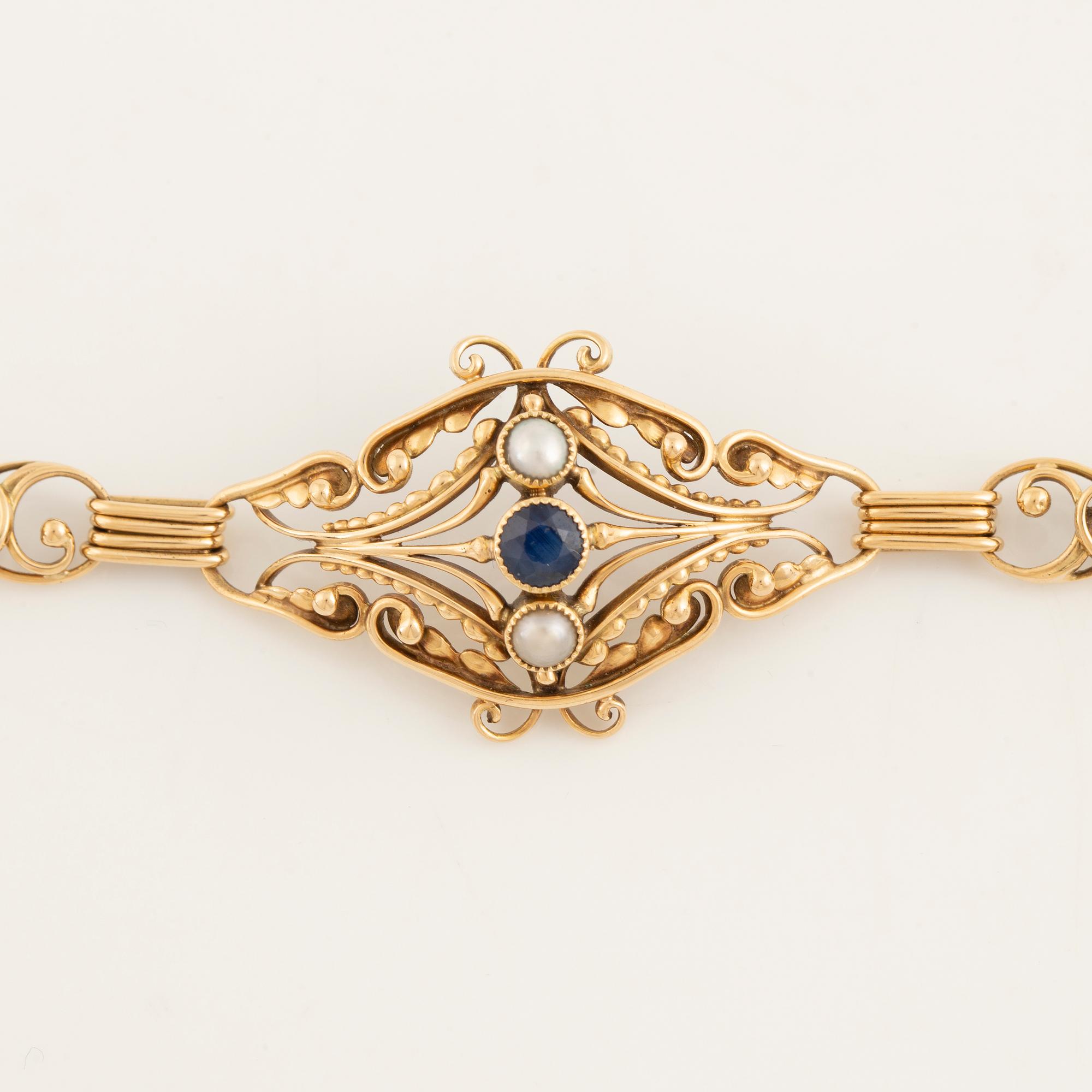 Gold, pearl and sapphire bracelet.