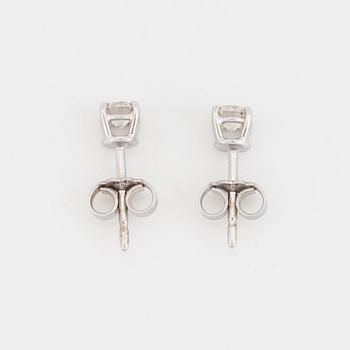 Brilliant-cut diamond earrings.