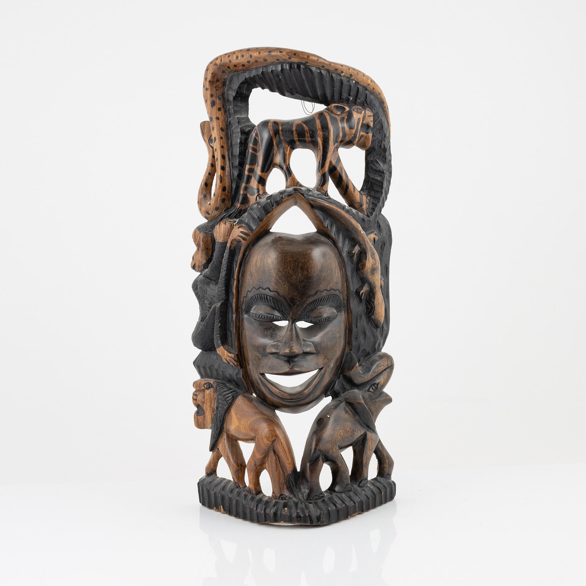 A wooden mask, Gambia, 21st Century.