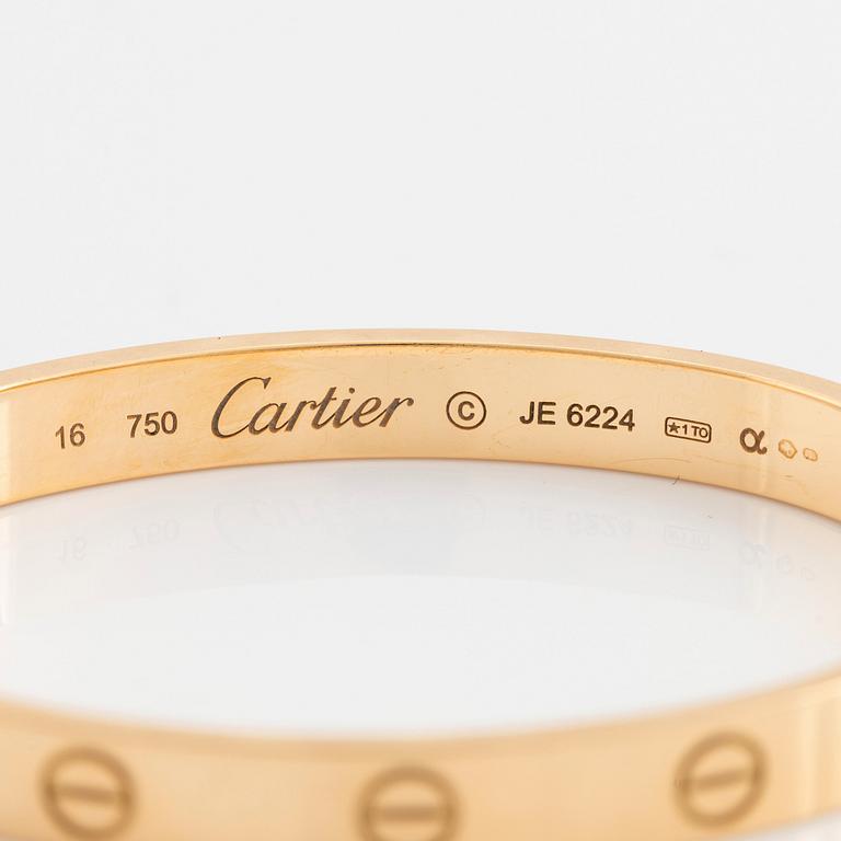 A Cartier "Love" bracelet in 18K gold.