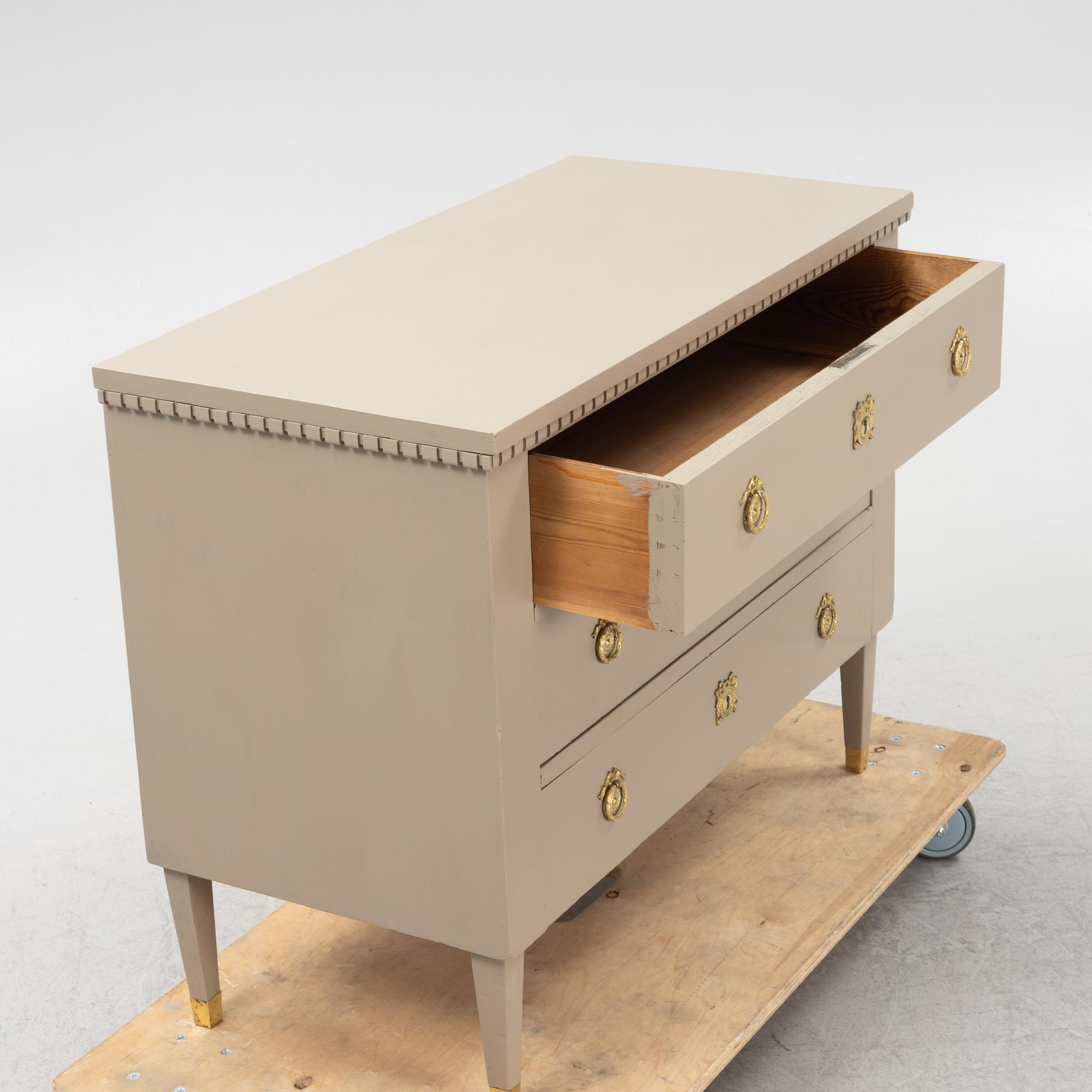 A painted Gustavian style chest of drawers, first half of the 20th century.