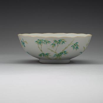 A famille rose bowl, late Qing dynasty, with Daoguangs sealmark in red.