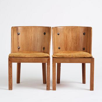 Axel Einar Hjorth, a pair of stained pine 'Lovö' chairs, Nordiska Kompaniet, Sweden 1930s.