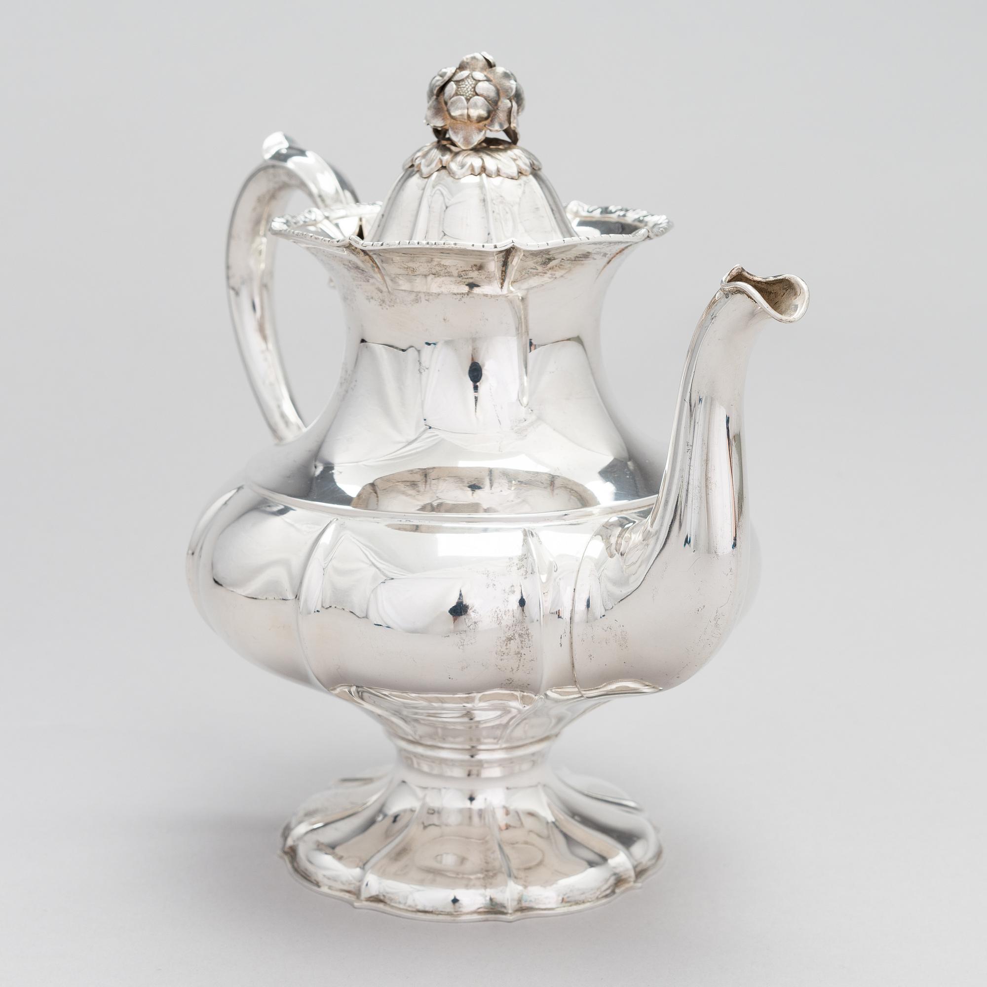 A silver coffee pot, a parcel-gilt sugar bowl and cream jug, Turku Finland 1946 and 1985.