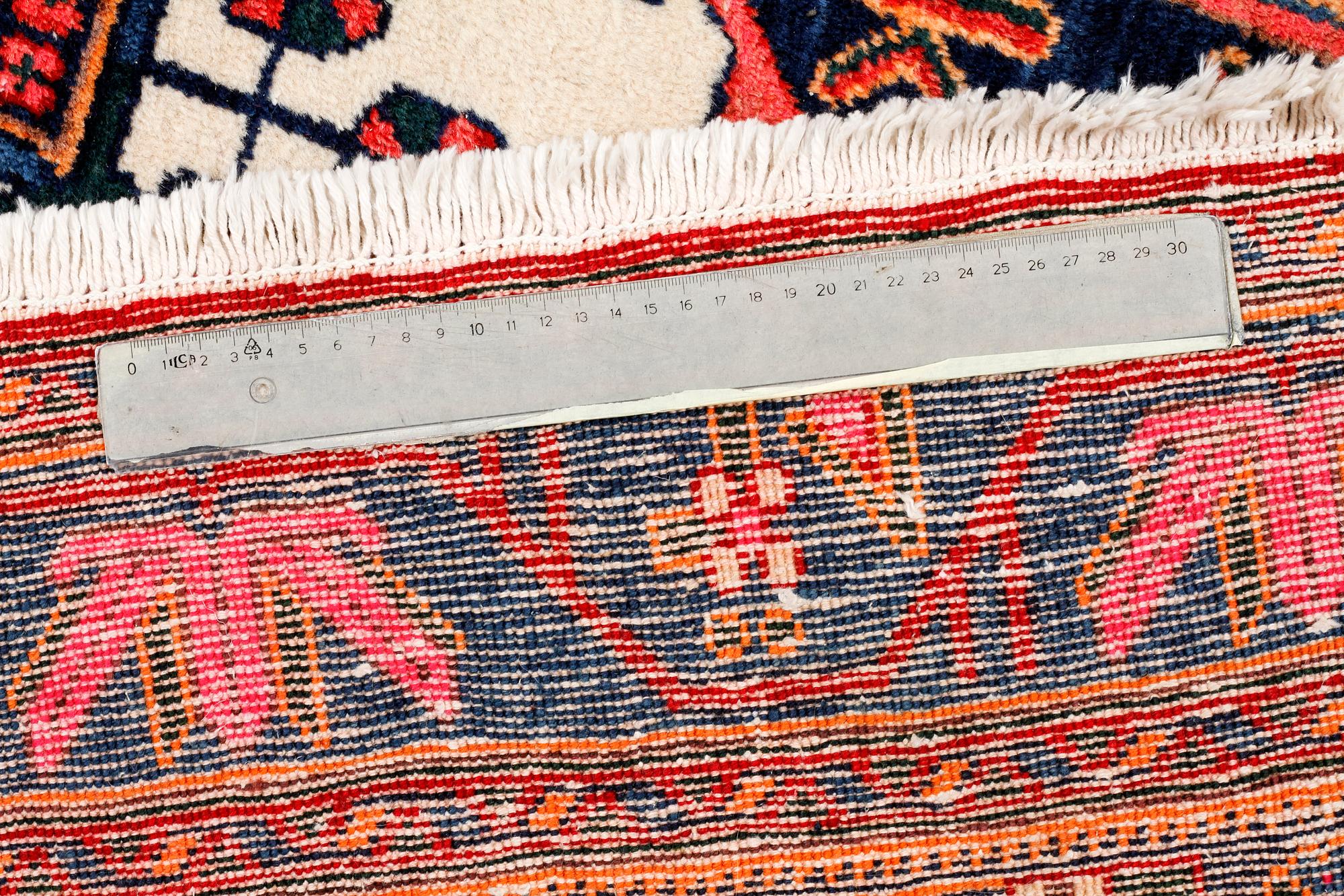 A north west persian rug, 218 x 159 cm.