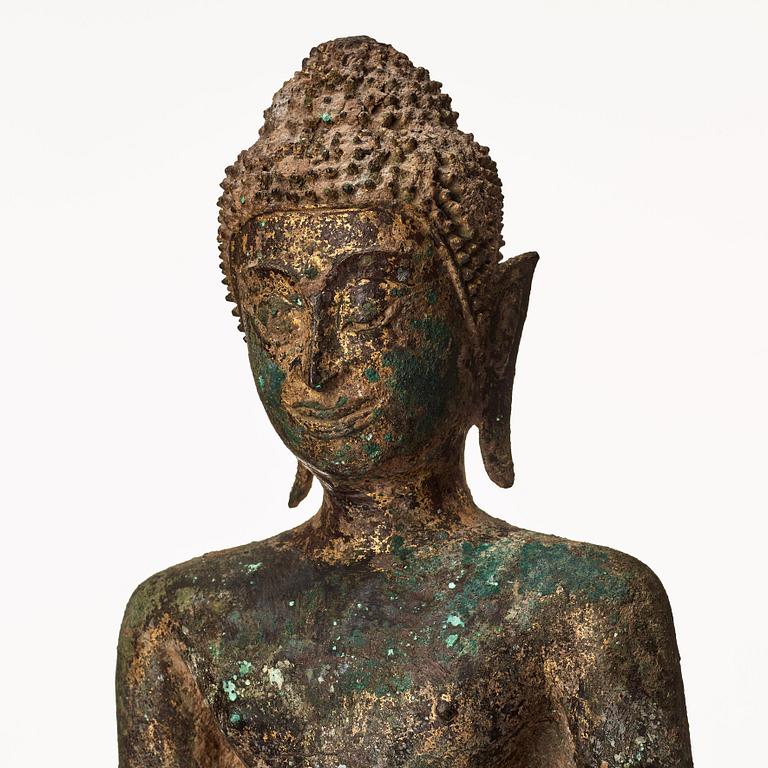 A standing figure of Buddha, Thailand, 18th Century.