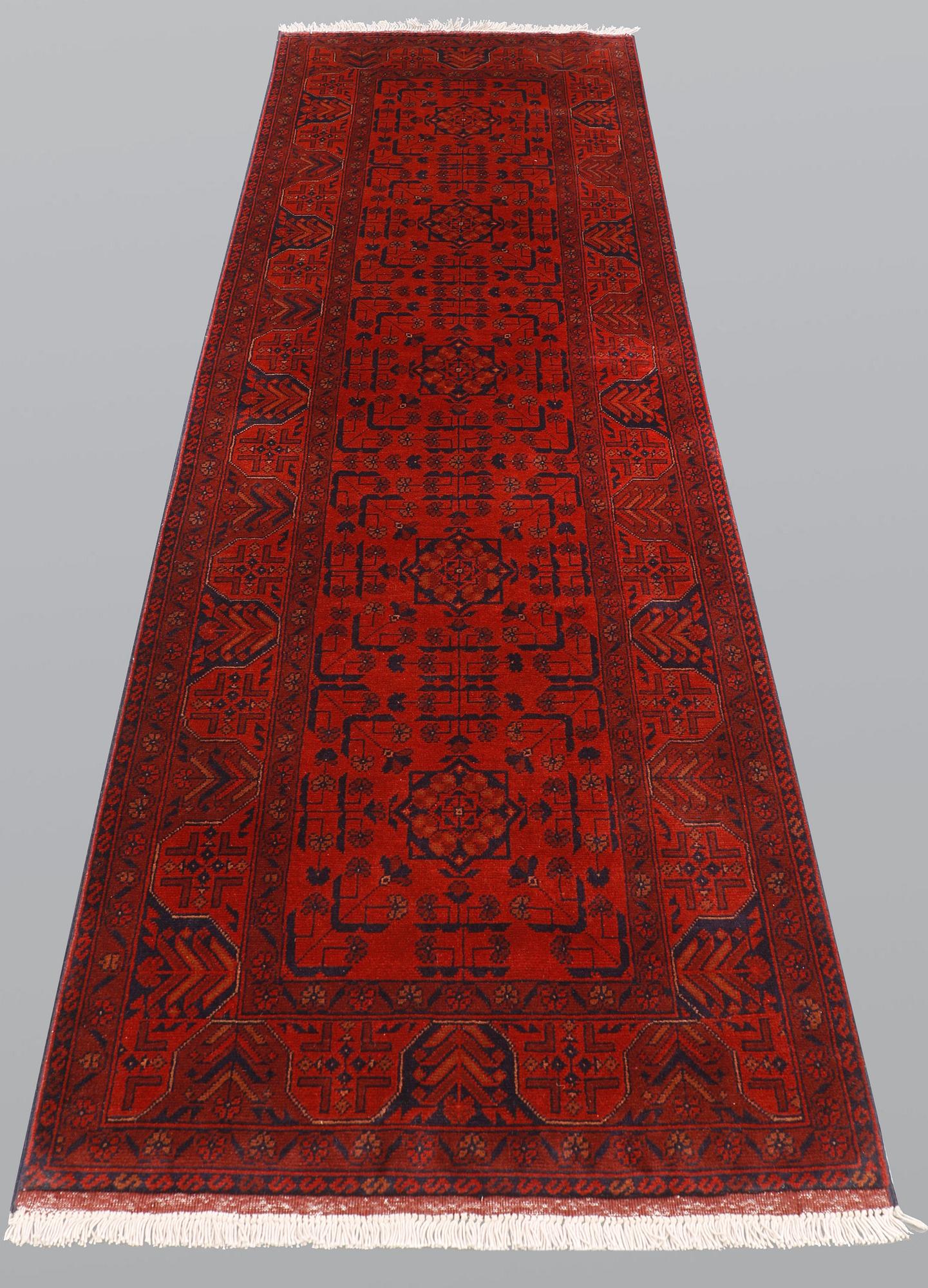 An Afghan runner, so called Khan Mohammadi, ca 297 x 78 cm.