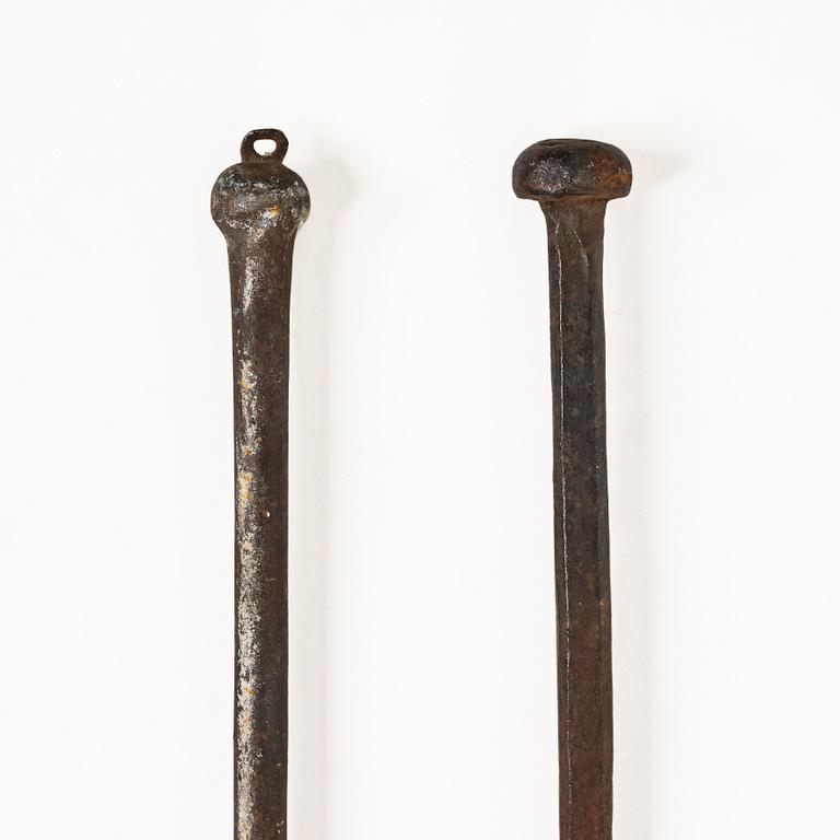 A set of two wrought iron fire pokers, 18th / 19th centiry.