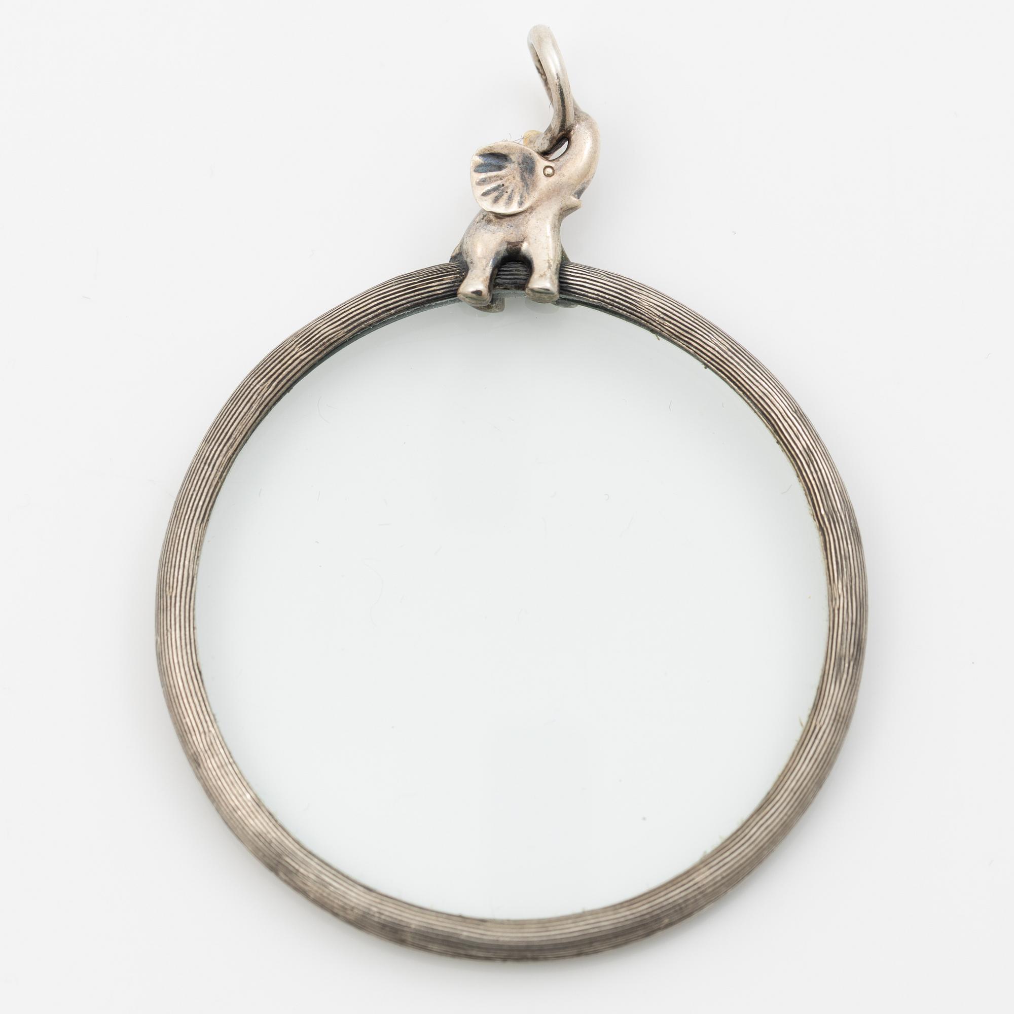 Ole Lynggaard, Magnifying glass, silver with a brilliant-cut diamond, decorated with an elephant motif.