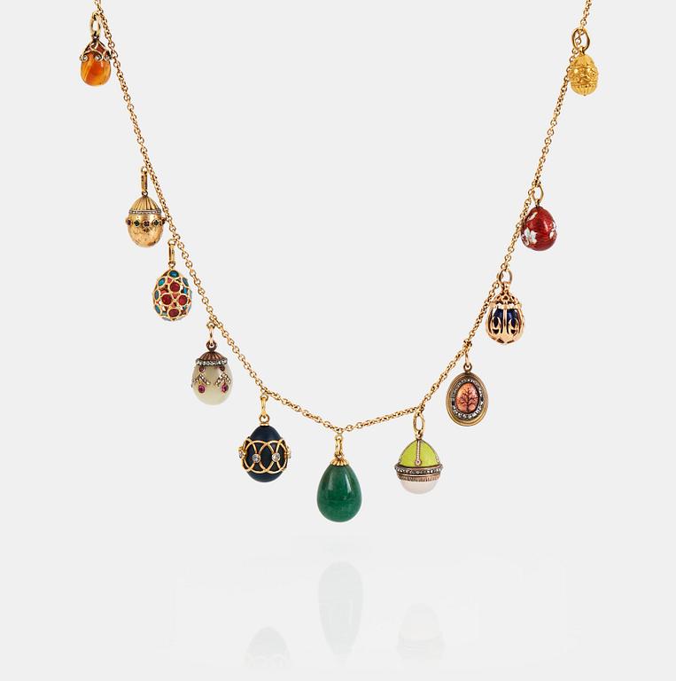 A FABERGÉ  GOLD Chain Necklace WITH 8 GOLD, ENAMEL ETC MINIATURE EASTER EGG PENDANTS, S.T PETERSBURG and 3 other.