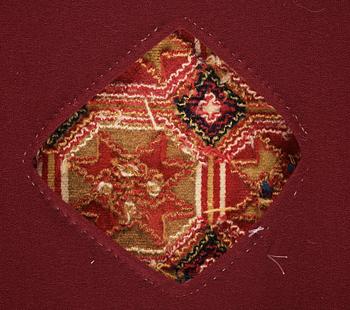 A CARRIAGE CUSHION, double-interlocked tapestry, "Stjärnmönster", ca 43,5-44,5 x 94-95 cm, Scania (Sweden).