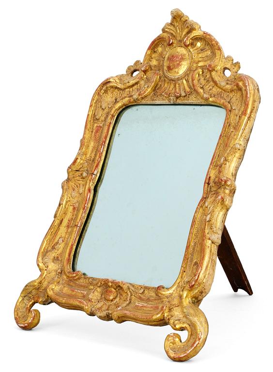 A Rococo toilette mirror.