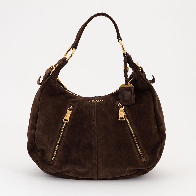 Prada, a brown suede handbag.