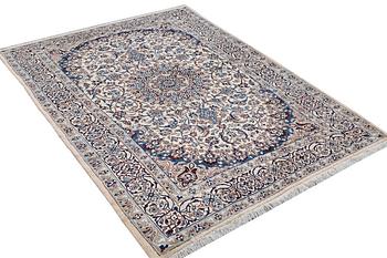 A carpet, Nain, part silk, 9 laa, ca 293 x 199 cm.