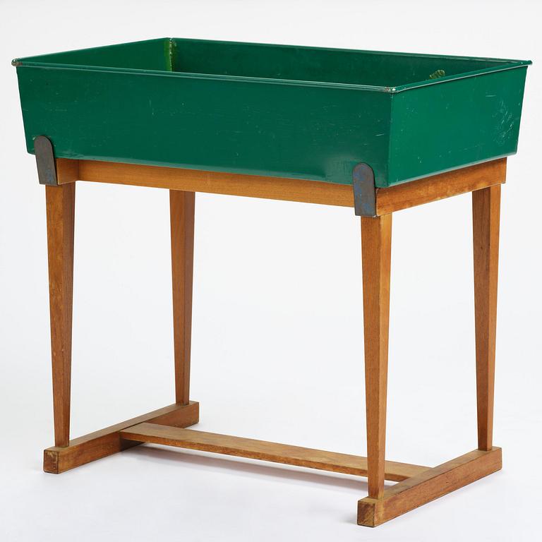 Josef Frank, a rare flower table with green lacquered box model "B 2084", Firma Svenskt Tenn, Sweden, 1950-60s.