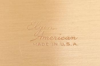 PUDERDOSA, mässing och svart emalj, Elgin, 1900-talets mitt.