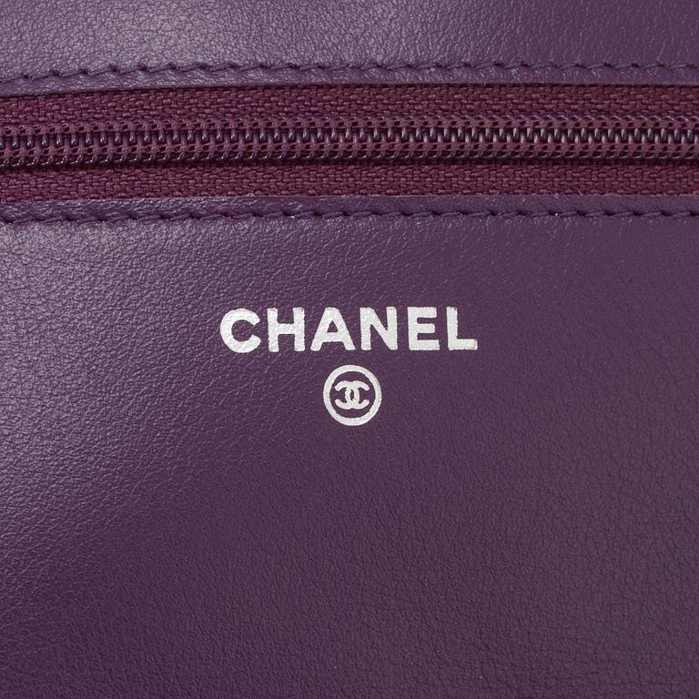 A purple lacquer handbag by Chanel  2011.