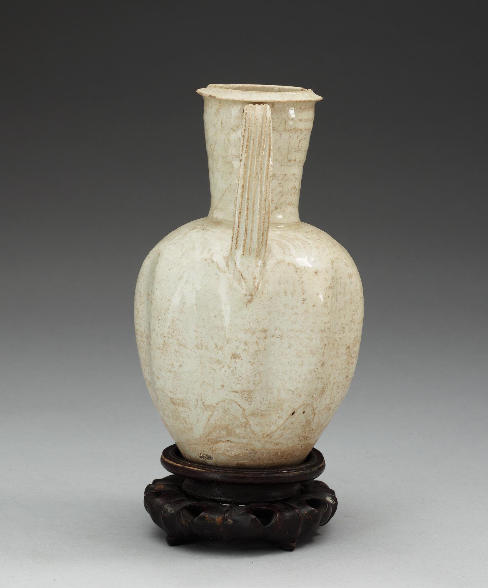A white glazed ewer, Song dynasty (960-1279).
