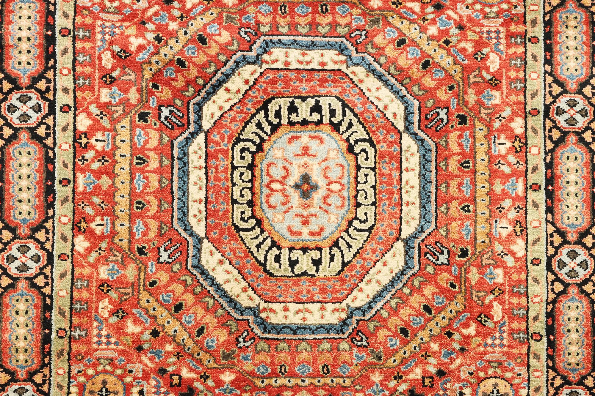 A Mamluk design carpet, c. 304 x 235 cm.