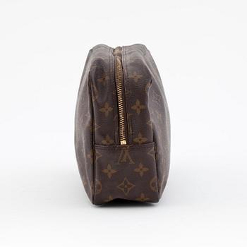 LOUIS VUITTON, a monogram canvas toiletry case.