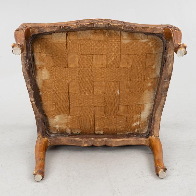 A pair of French Louis XV fauteuils, mid 18th century.