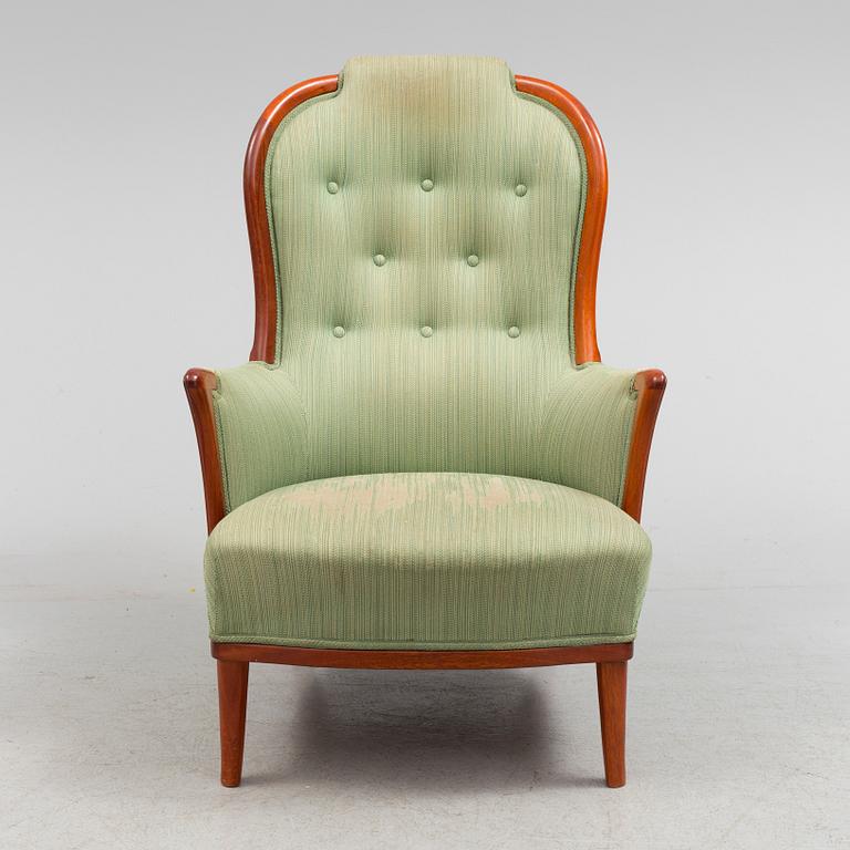 A "Vår Fru" lounge chair by Cral Malmsten.