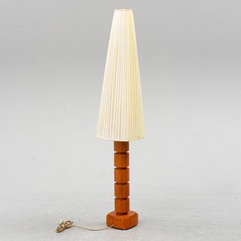 A Möllers Armatur Teak and brass lamp, Eskilstuna, mid 20th Century.