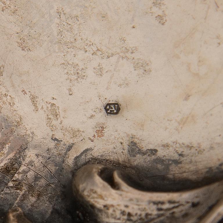 A German silver tray, mark of M.H. Wilkens & Söhne, Austrian import mark, retailer mark of V. Mayers Söhne, 1891-1901.