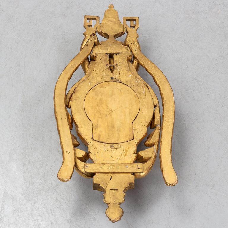 An 18th century Louis XV wall clock Jean-Petit L´Aine, Amsterdam.