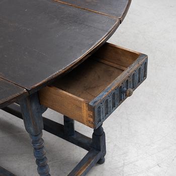 A Baroque style gate-leg table, 19th Century.