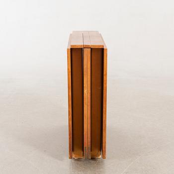 A teak and birch 'Maria Flap' gate leg table by Bruno Mathsson for Karl Mathsson.
