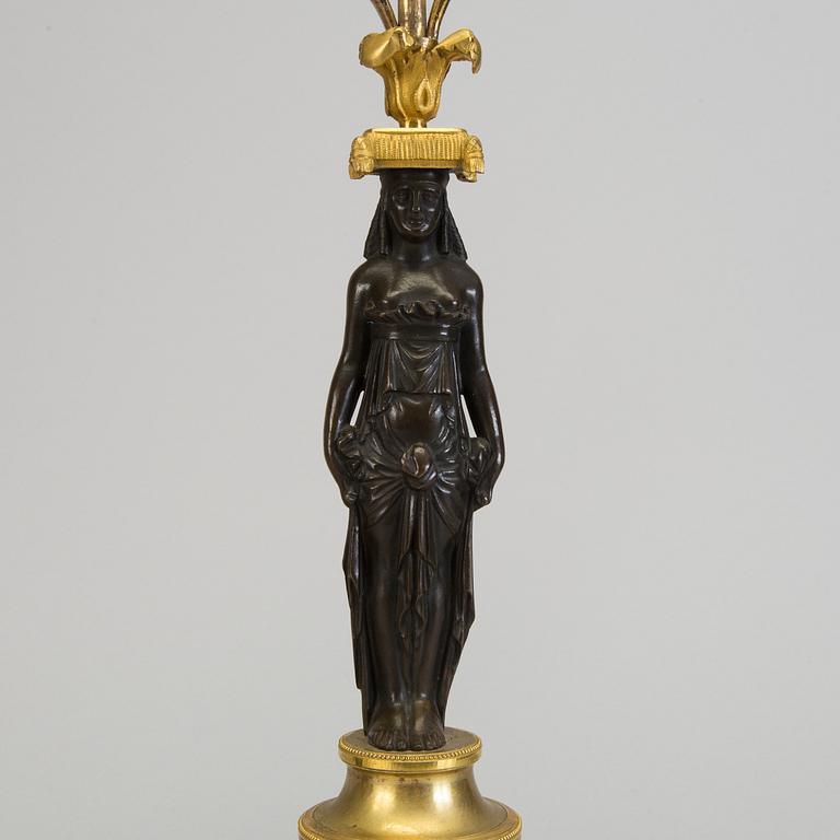 A pair of 1800s empire candelabras.