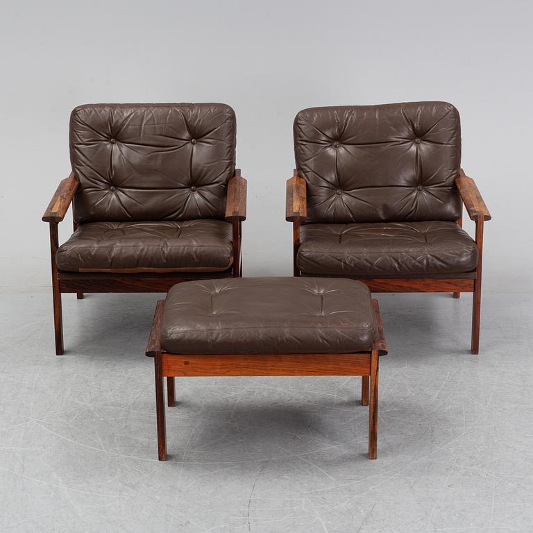 Illum Wikkelsö, a pair of 'Capella' easy chairs and one stool. Eilersen, Denmark. Designed 1959.