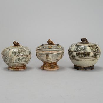 A set of three Sawankhalok boxes with covers, 15th / 16th Century.