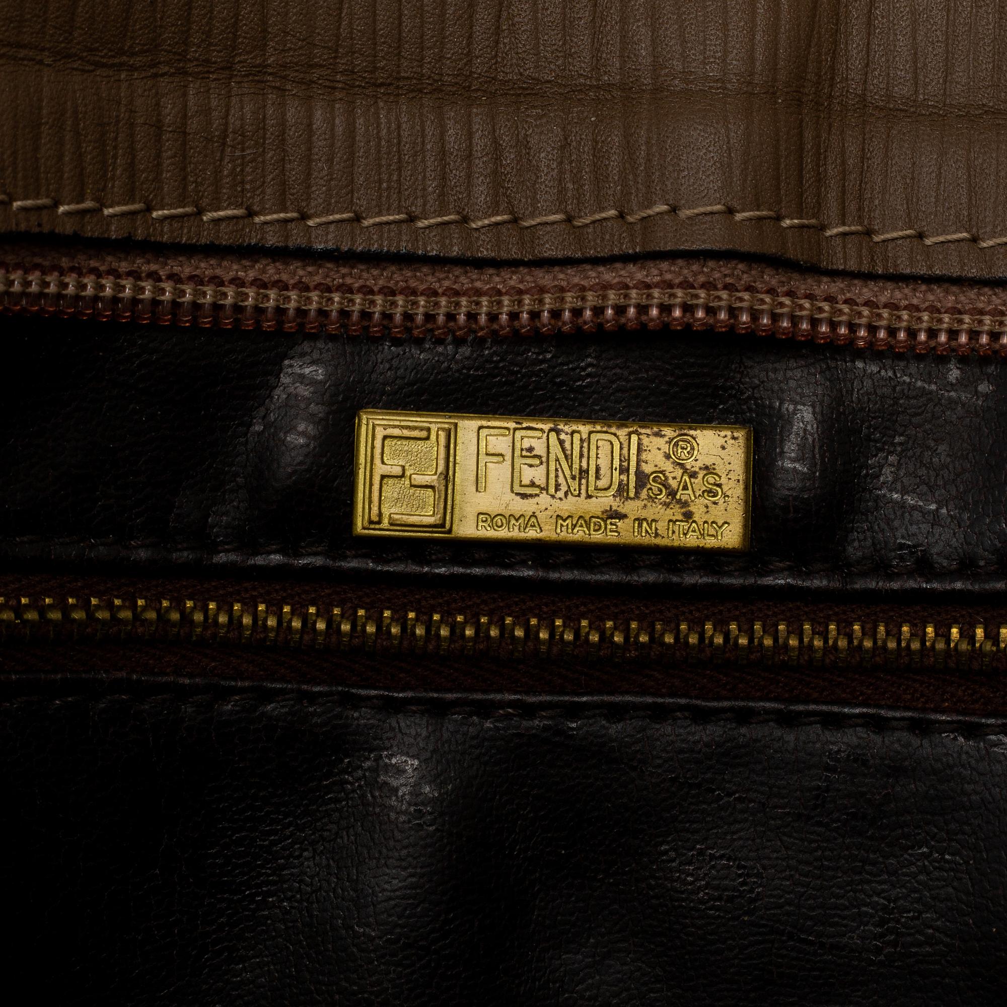FENDI, a textile handbag.