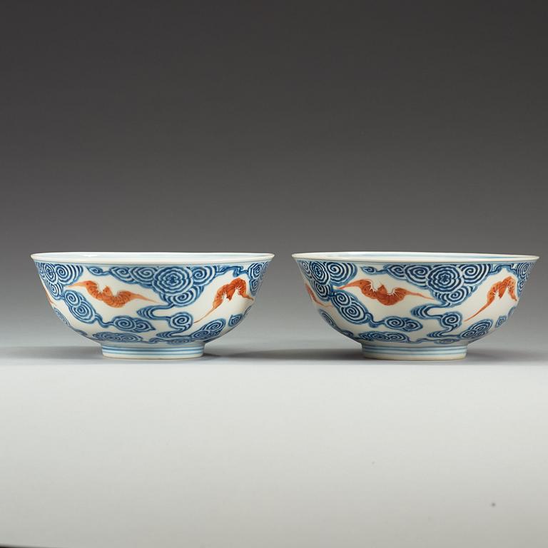 A pair of blue and white 'bats' bowls, China, 20th century, with Guangxu six character mark.