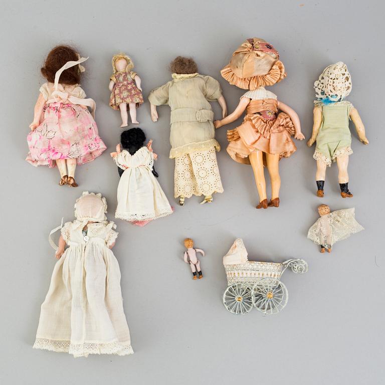 9 German porcelain dolls and 1 stroller from the 1910-/20's.