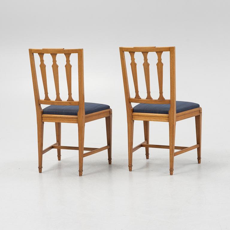 A Dining Table and Twelve Chairs, late Gustavian style, 20th Century.