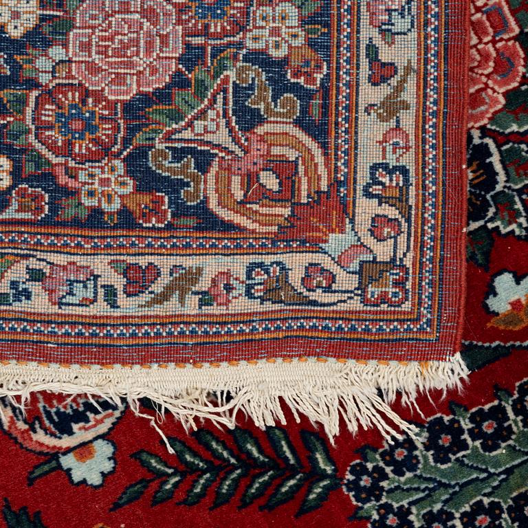 A rug, Quum, c. 200 x 132 cm.