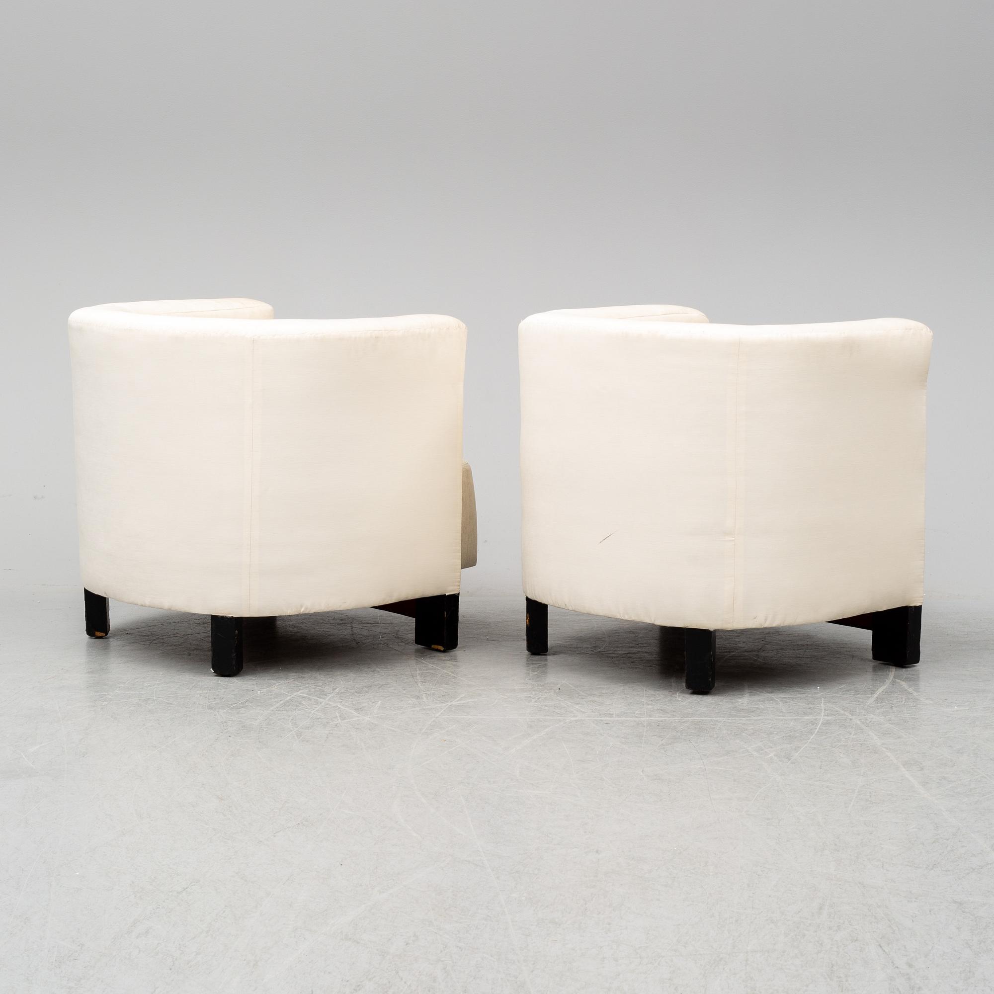 A pair of Italian easy chairs, late 20th Century.