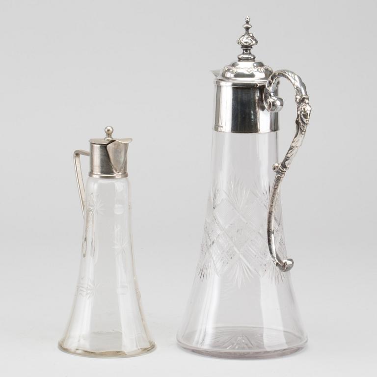 KANNOR, 2 st, nysilver och glas, omkring 1900.