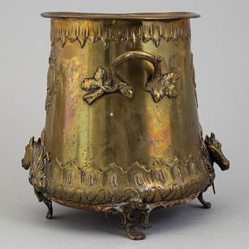 A LATE 19TH CENTURY BRASS CHAMPAGNE COOLER.