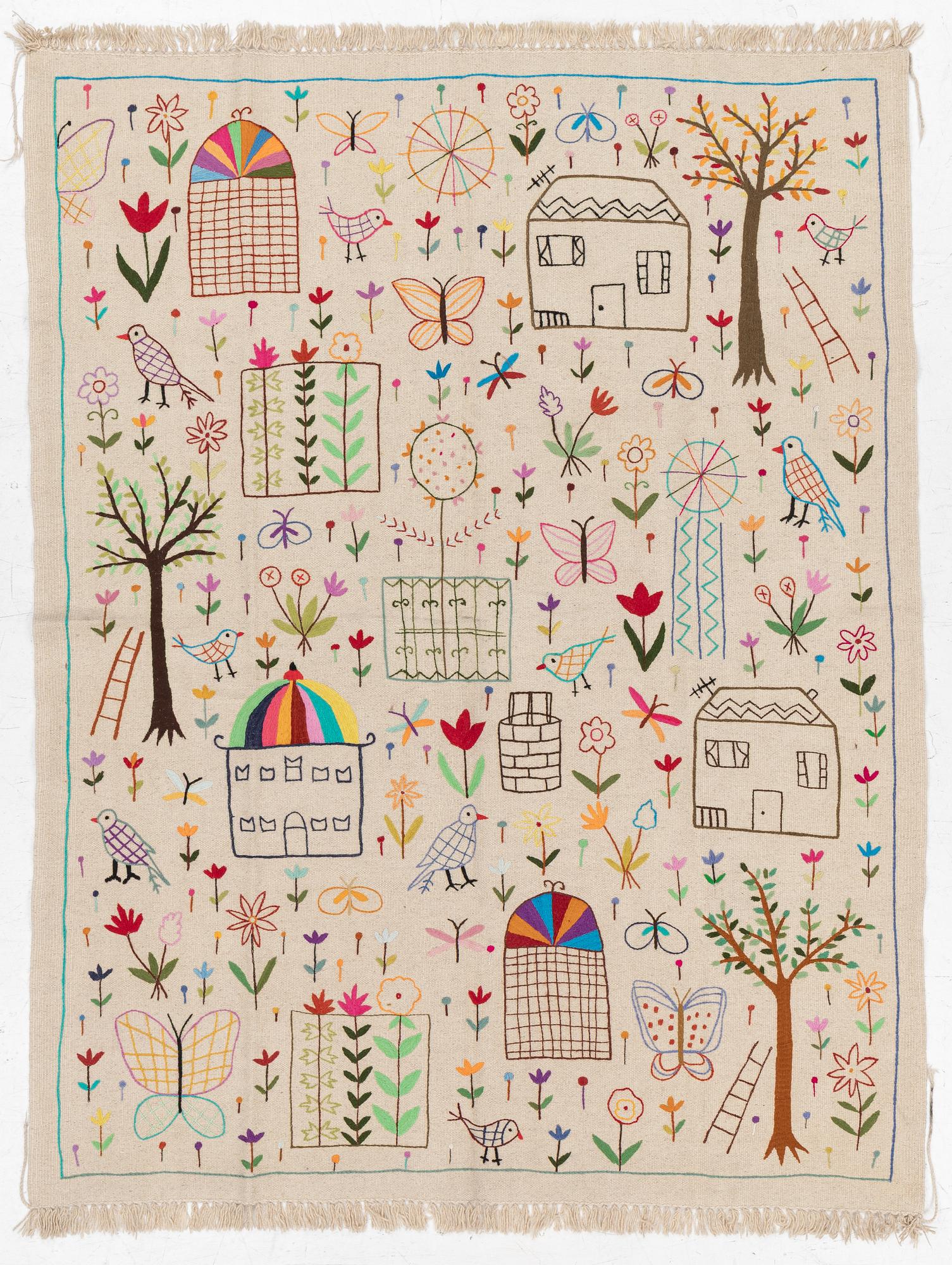 A hand-embroidered kilim rug, c. 224 x 172 cm.